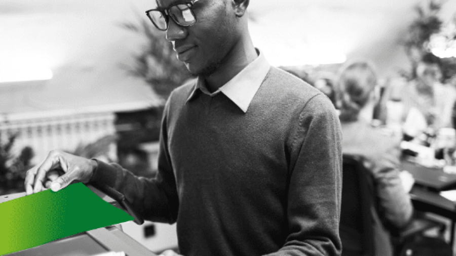 A man is scanning a document