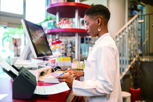 Woman looking into a computer screen