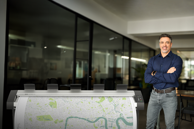 Man next to HD Ultra X scanner