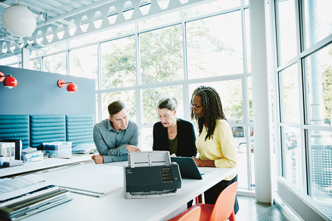 People going through some papers